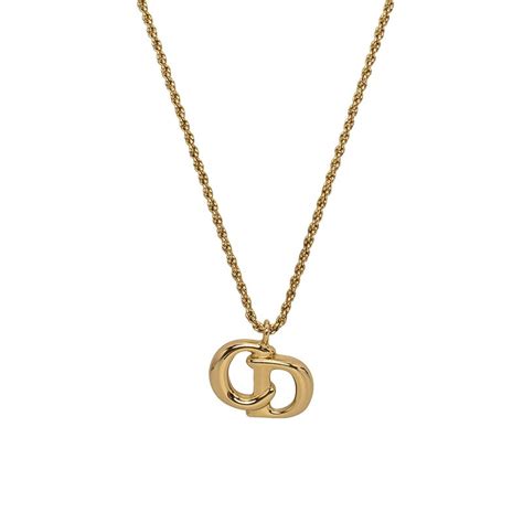 gold dior logo necklace|necklace that says dior.